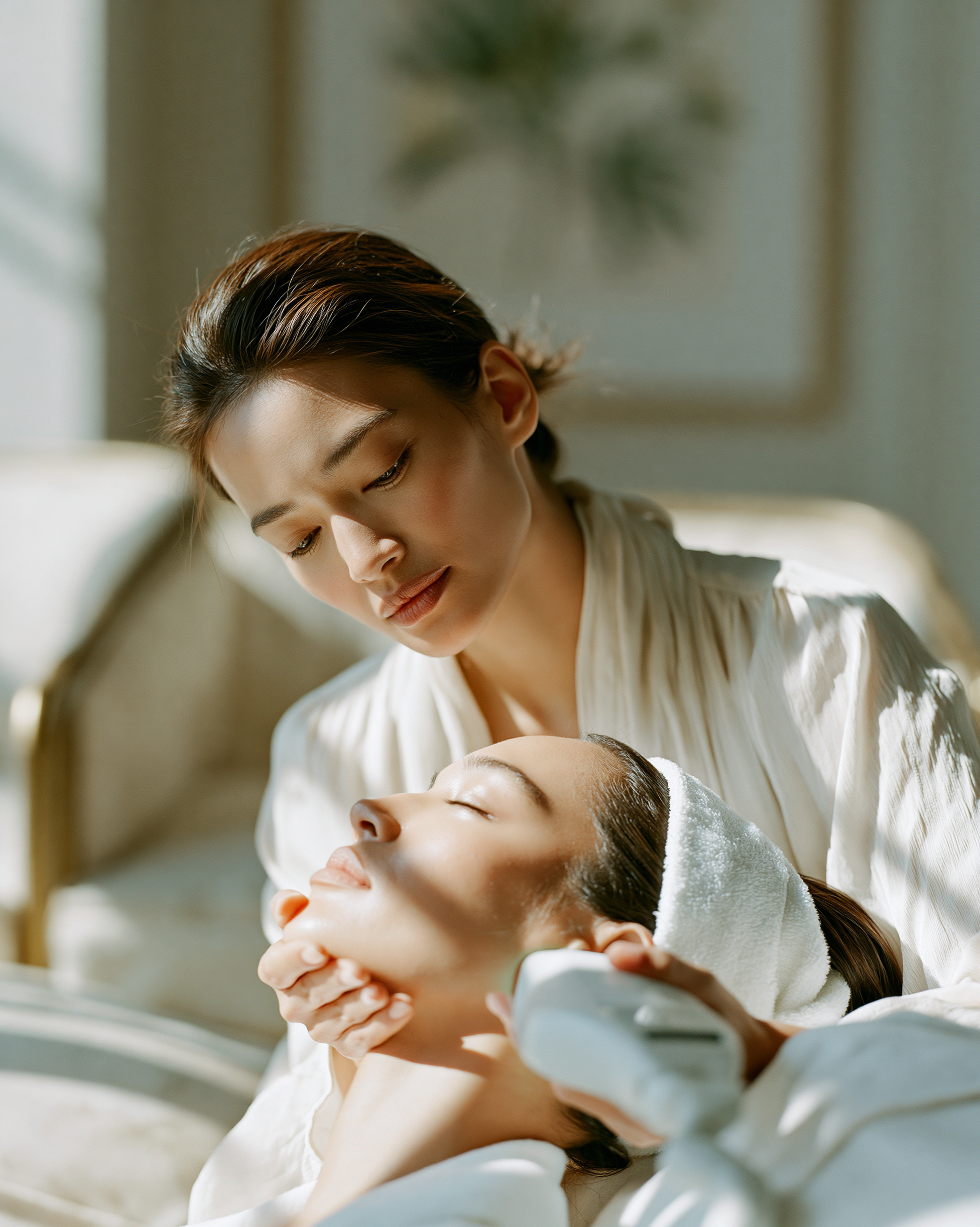 Dermatologist examining skin with professional equipment in a calm clinic room